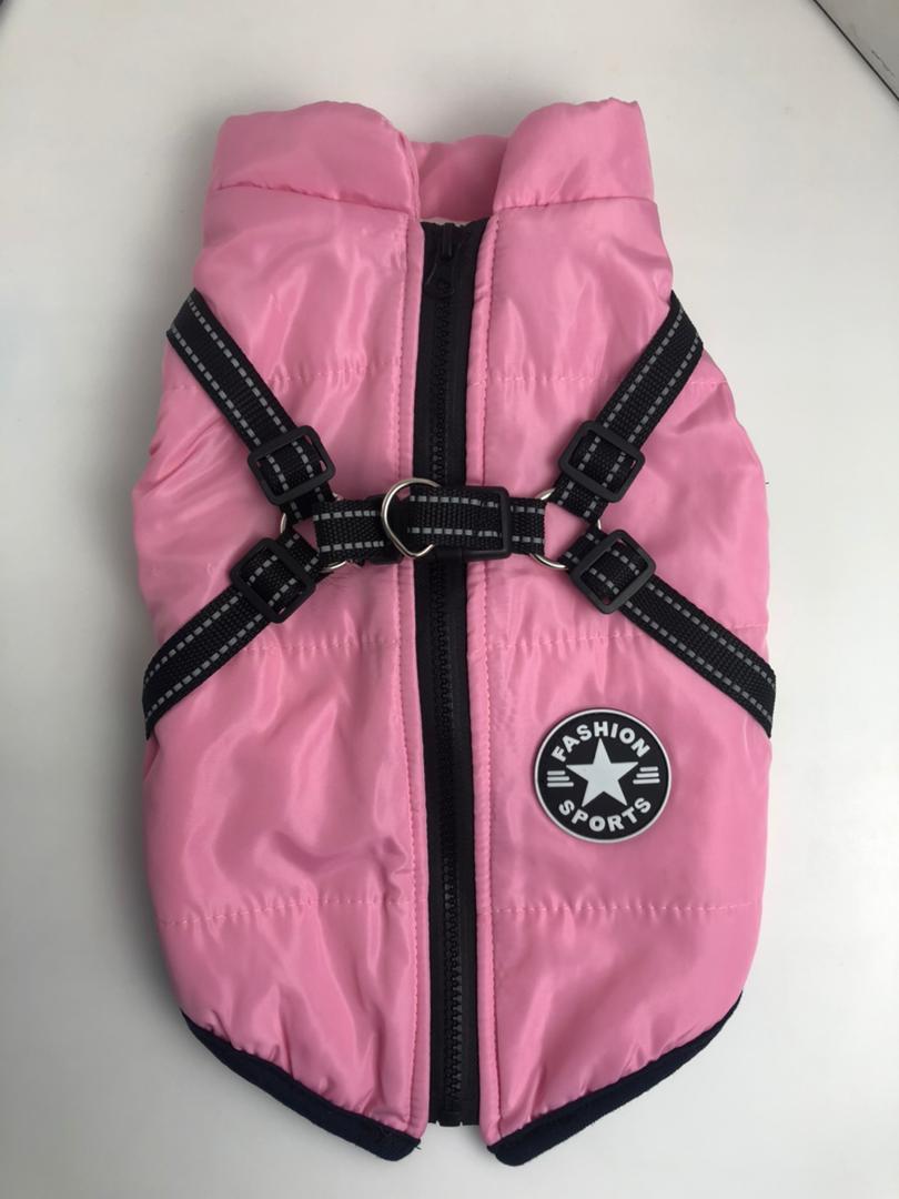 Pink dog coat with black straps and a visible brand logo on a white background