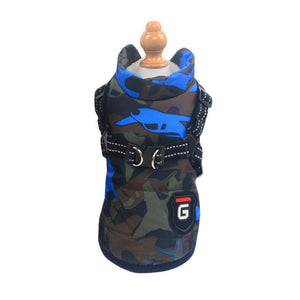 Camouflage dog harness with blue accents on a mannequin against a white background