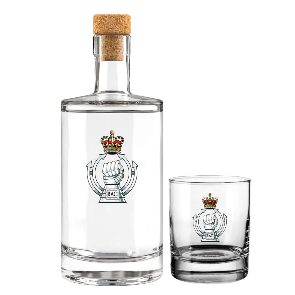 A clear glass bottle with a cork stopper and a matching clear glass tumbler, both printed with a crest-style emblem featuring a crown, raised fist, and the letters RAC. The bottle is larger and placed on the left, with the smaller tumbler on the right, against a light gray background with faint geometric shapes.