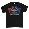 A black short-sleeve t-shirt with a large graphic print on the front depicting a 'Army vs Navy 2027' match-up with Spartan figures, a banner reading 'Twickenham', and a small 'fg' logo printed inside the collar.