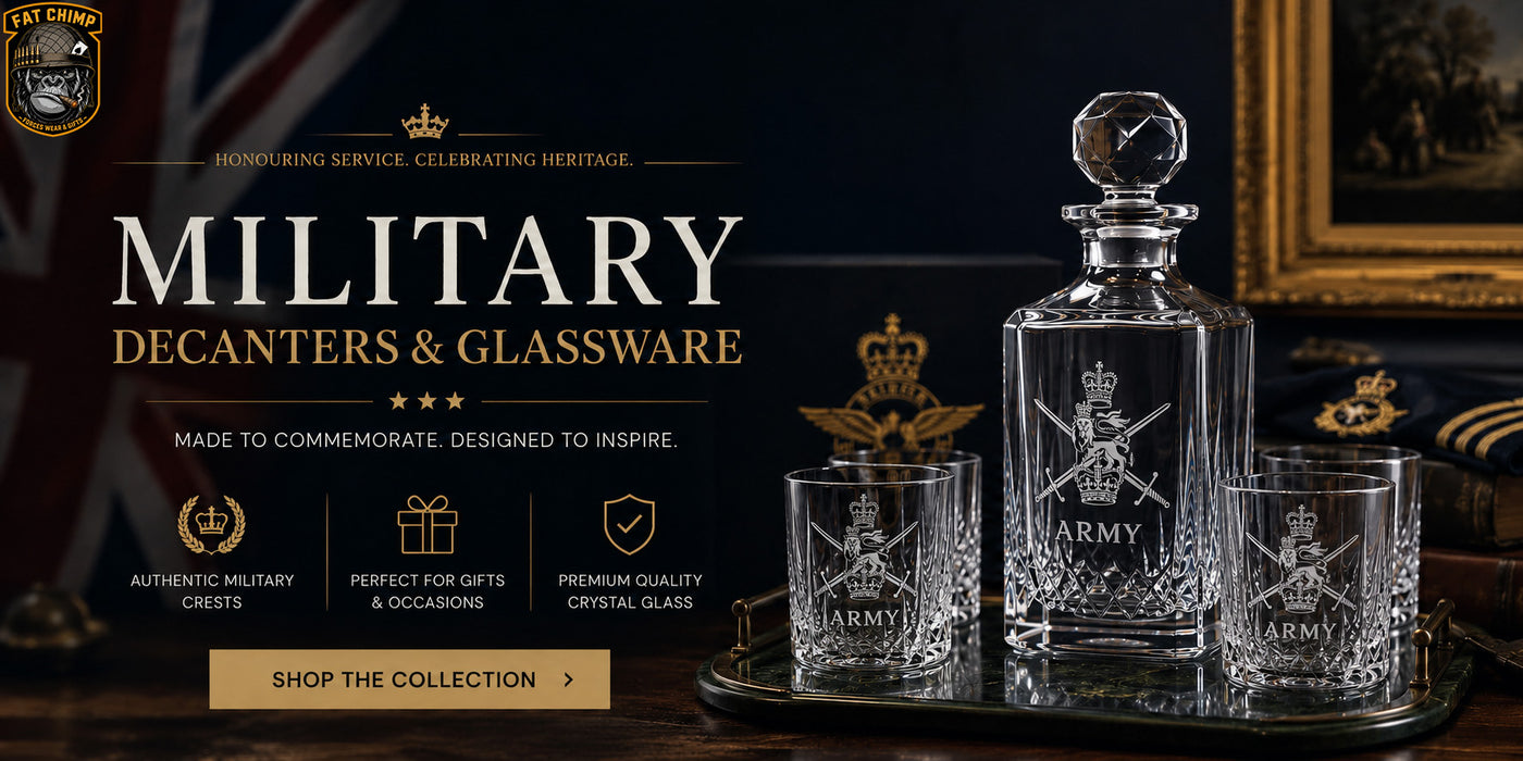 Military-themed decanters and glassware with engraved designs on a dark background.