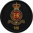 A circular embroidered patch featuring the Royal Horse Artillery VII insignia on a black fabric background. The design includes a gold crown, red and gold central crest with the letters ER, a blue scroll reading Royal Horse Artillery, and gold Roman numeral VII below.