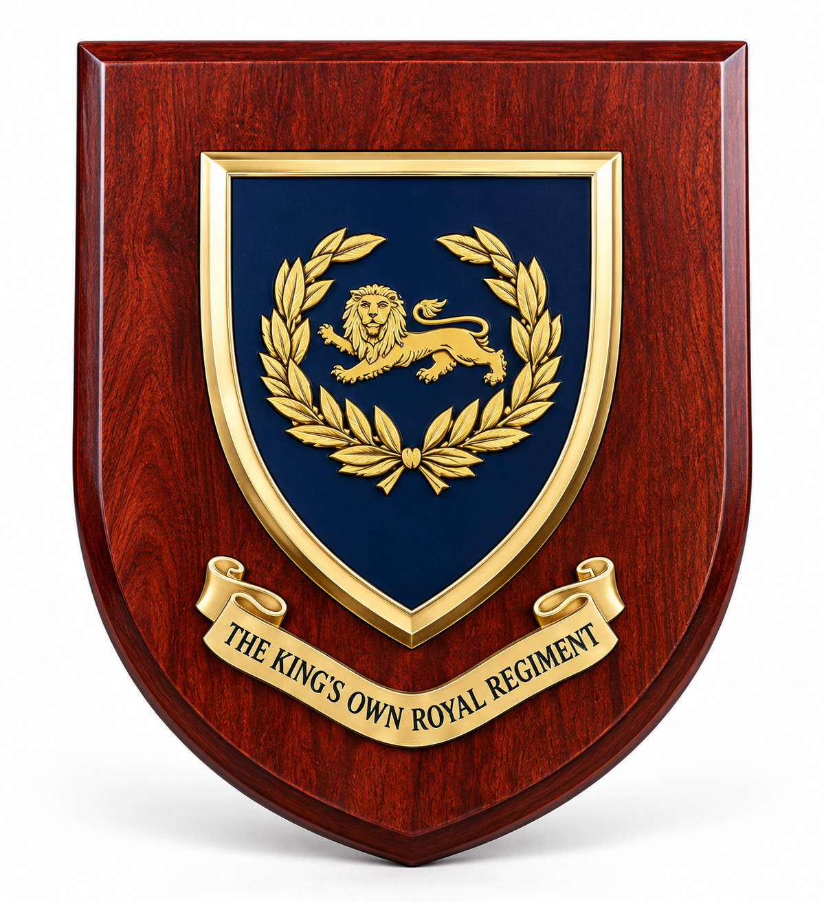 A custom wooden shield plaque featuring a dark blue center shield with a gold lion and laurel wreath, mounted on a reddish-brown wood-grain backing. A gold scroll at the bottom reads 'THE KING'S OWN ROYAL REGIMENT'.