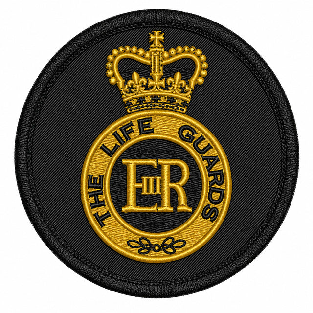 A circular embroidered patch featuring a black background with a gold crown and the text 'THE LIFE GUARDS' around a central 'ER' monogram.